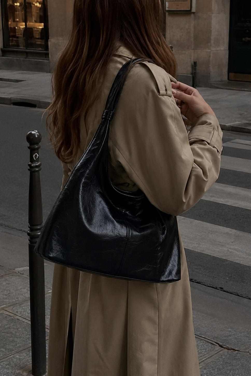 Black Crinkled Faux Leather Hobo Bag worn on shoulder