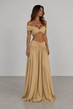 Beige off shoulder top and maxi skirt set angled view