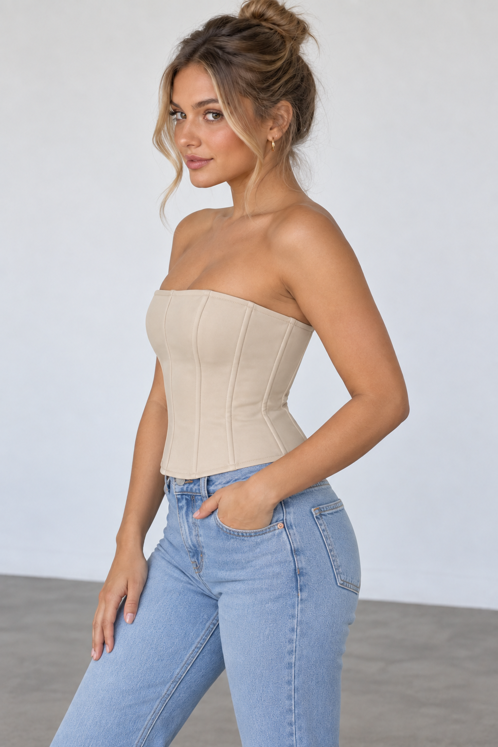 Beige strapless corset top angled view