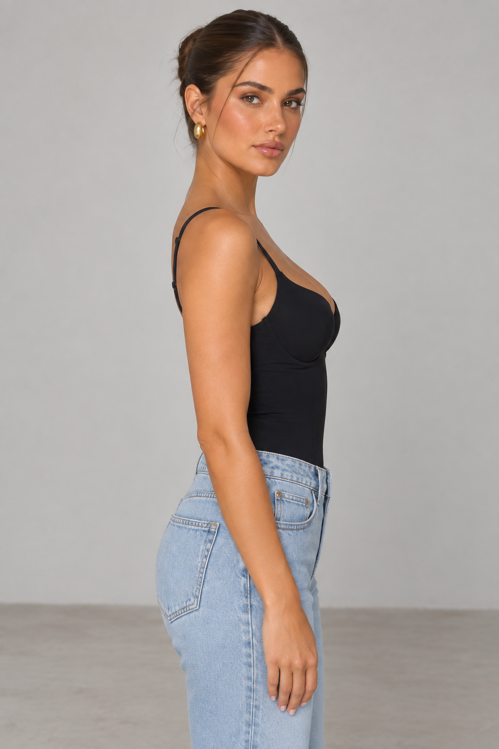 Black bustier bodysuit — side view