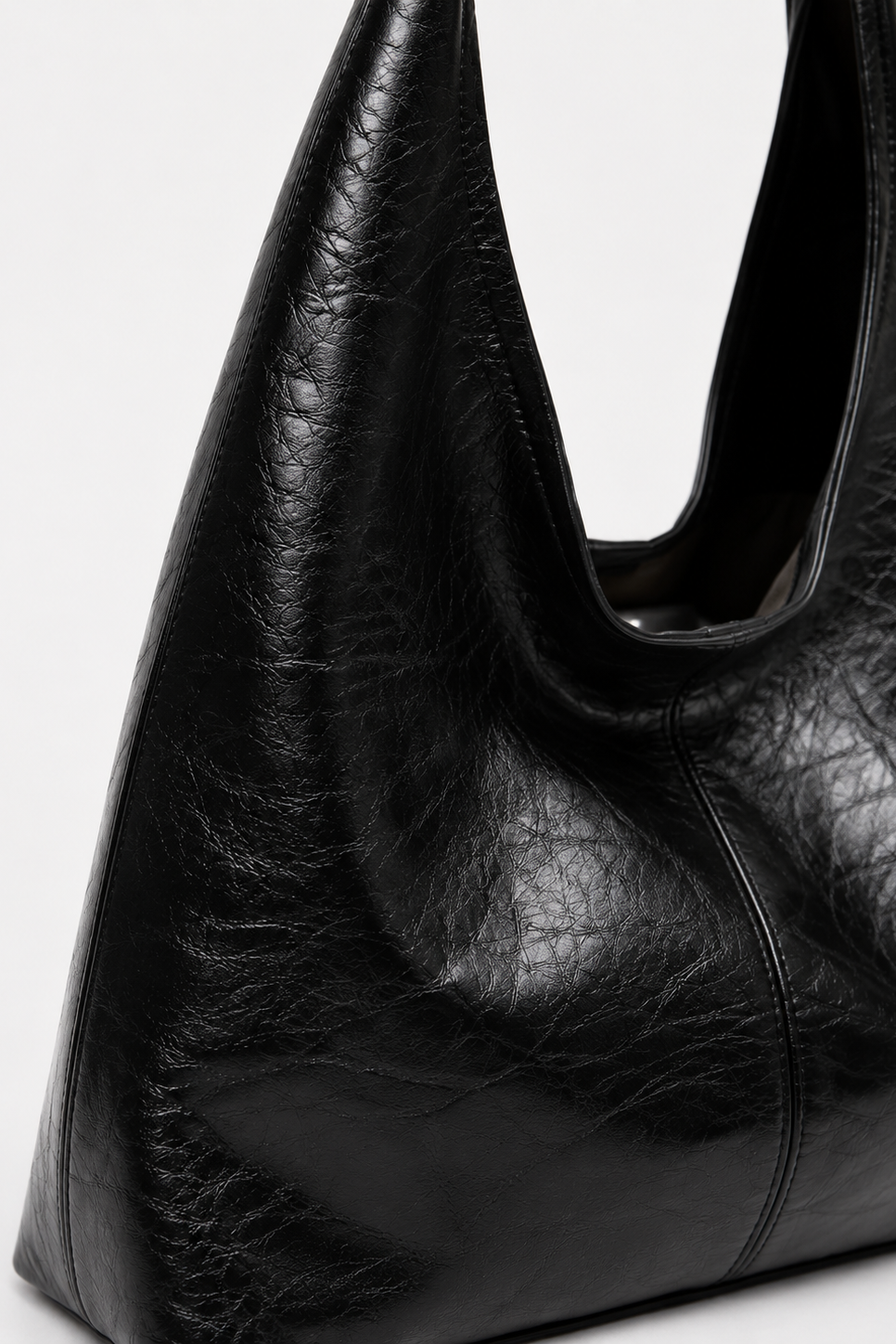 Black Crinkled Faux Leather Hobo Bag texture close up