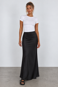 Black flared maxi skirt, full front view on model