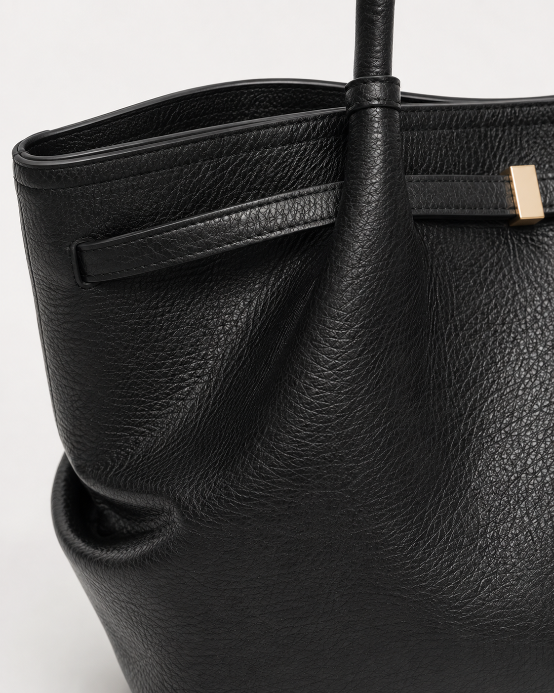 Black Pebbled Leather Tote Bag gold buckle detail close up