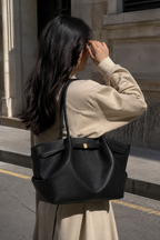 Black Pebbled Leather Tote Bag worn on shoulder