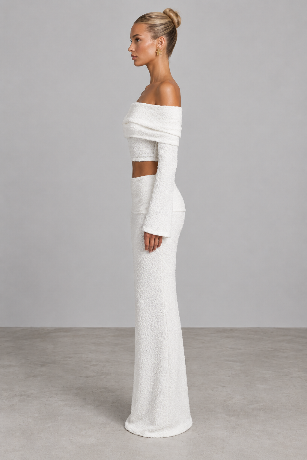 Ivory textured off-shoulder crop top and maxi skirt set, side view