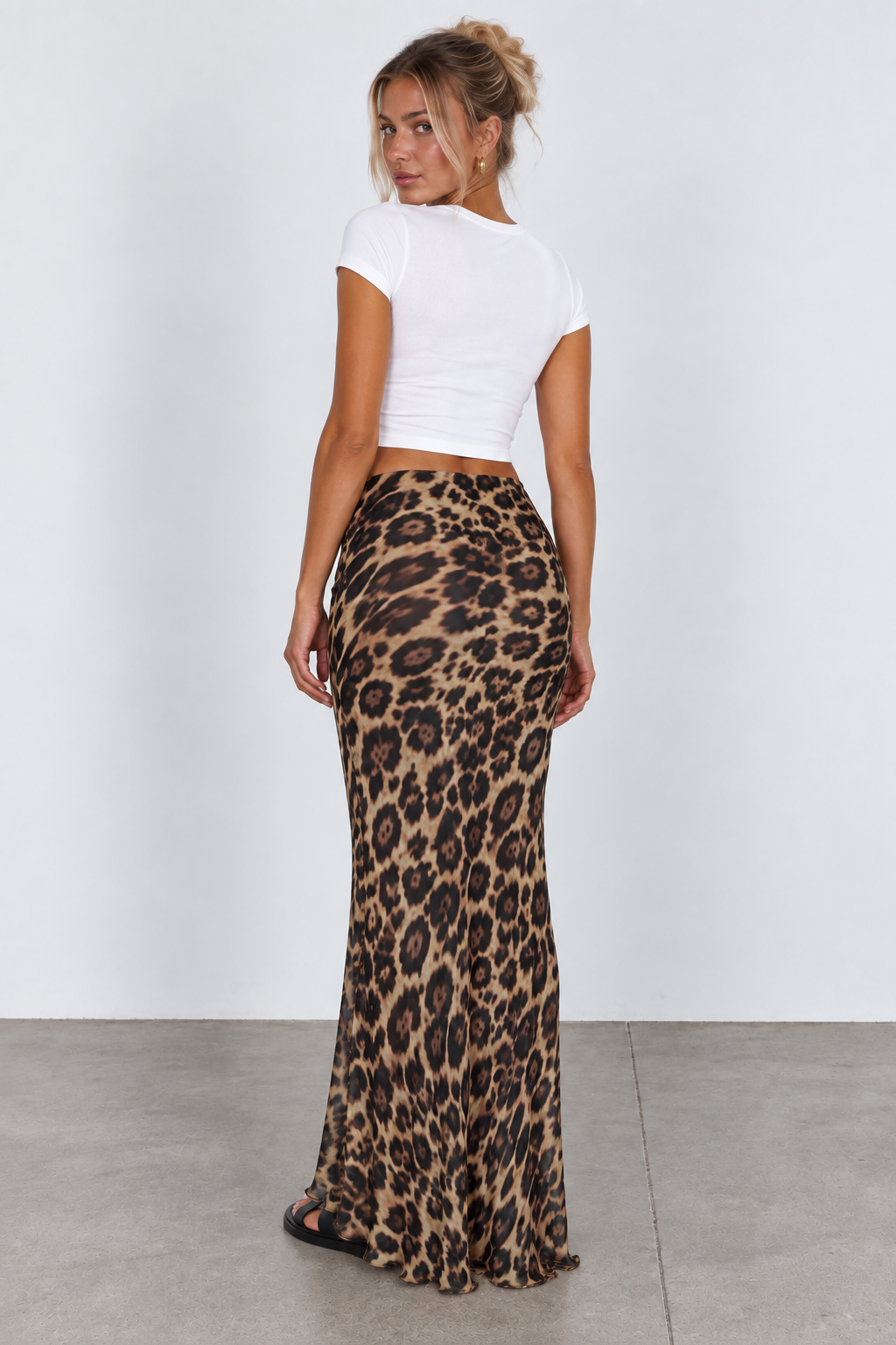 Leopard print maxi skirt, back view on model