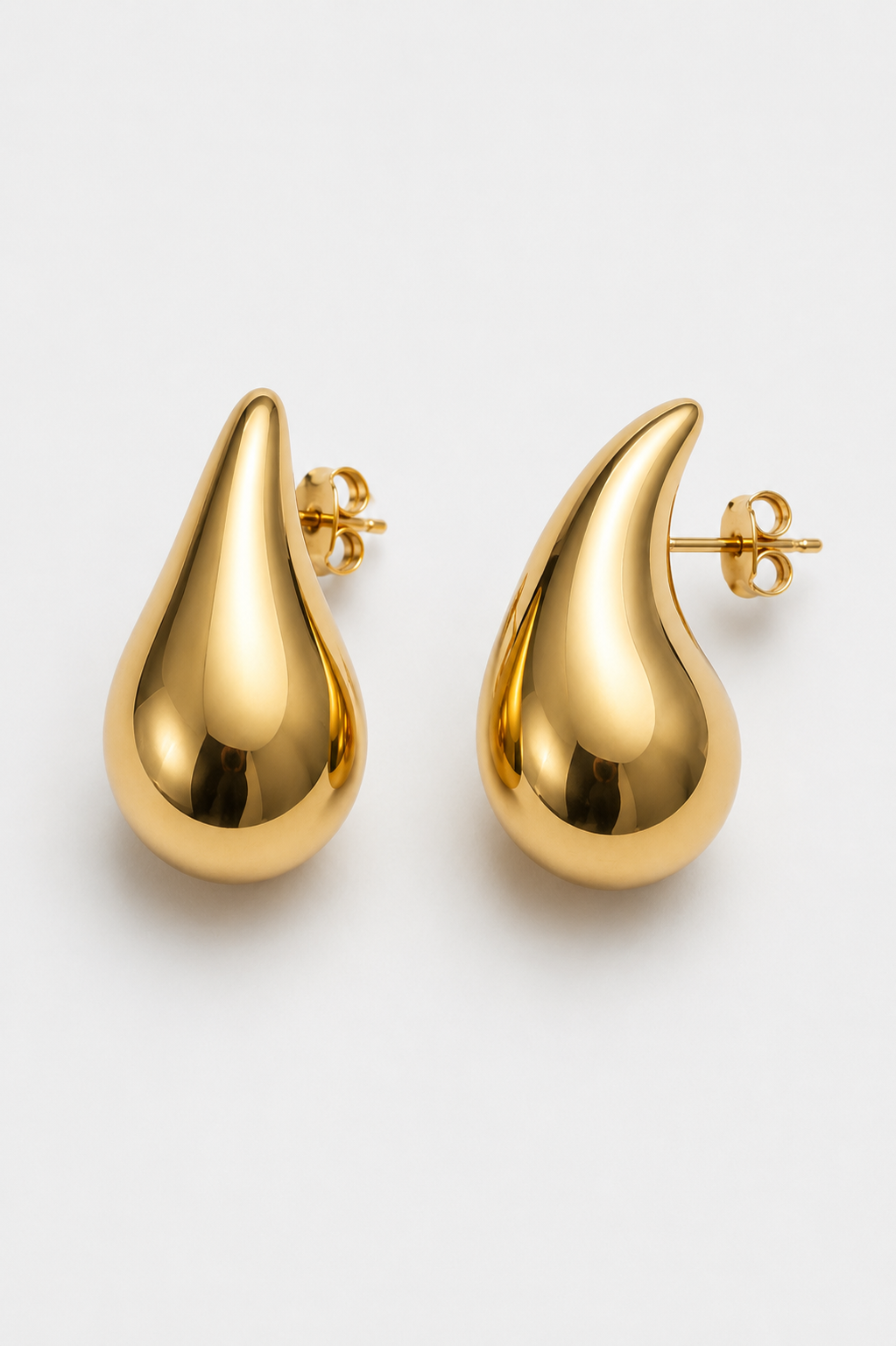 Nova Gold Drop Earrings studio shot